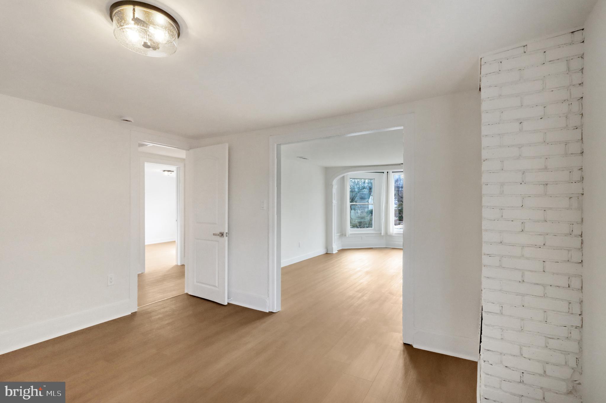 24369 West Main Street, Unit A Columbus, NJ 08022 - Photo 39 of 69 a view of livingroom with hardwood floor and window
