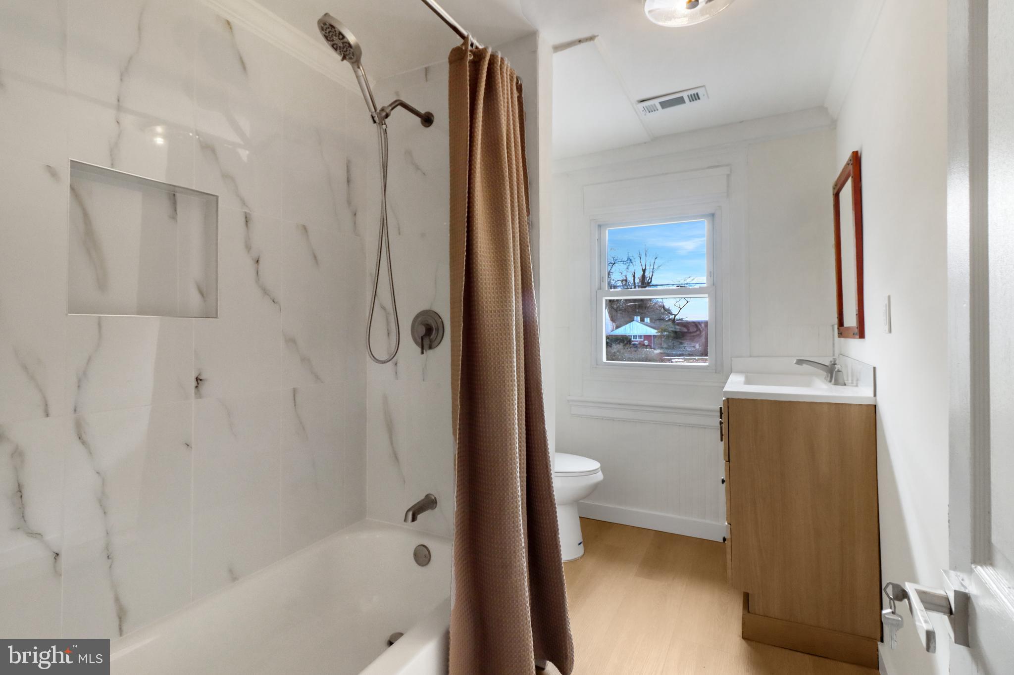 24369 West Main Street, Unit A Columbus, NJ 08022 - Photo 59 of 69 a bathroom with a shower a toilet and a sink
