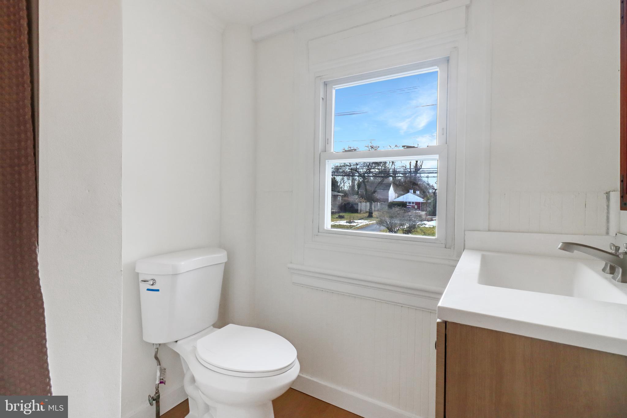 24369 West Main Street, Unit A Columbus, NJ 08022 - Photo 60 of 69 a bathroom with a toilet and a sink