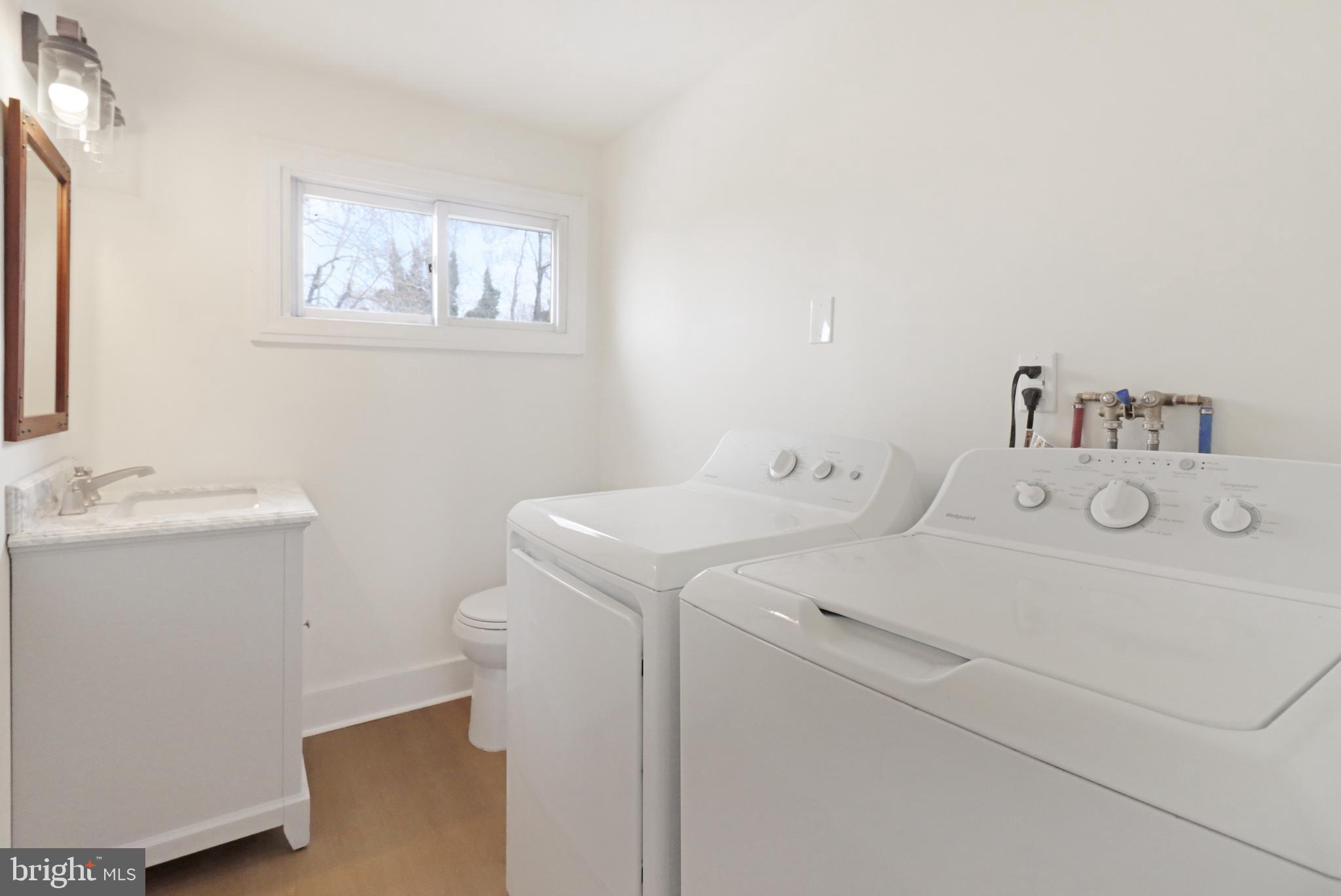 24369 West Main Street, Unit A Columbus, NJ 08022 - Photo 62 of 69 a utility room with dryer and washer