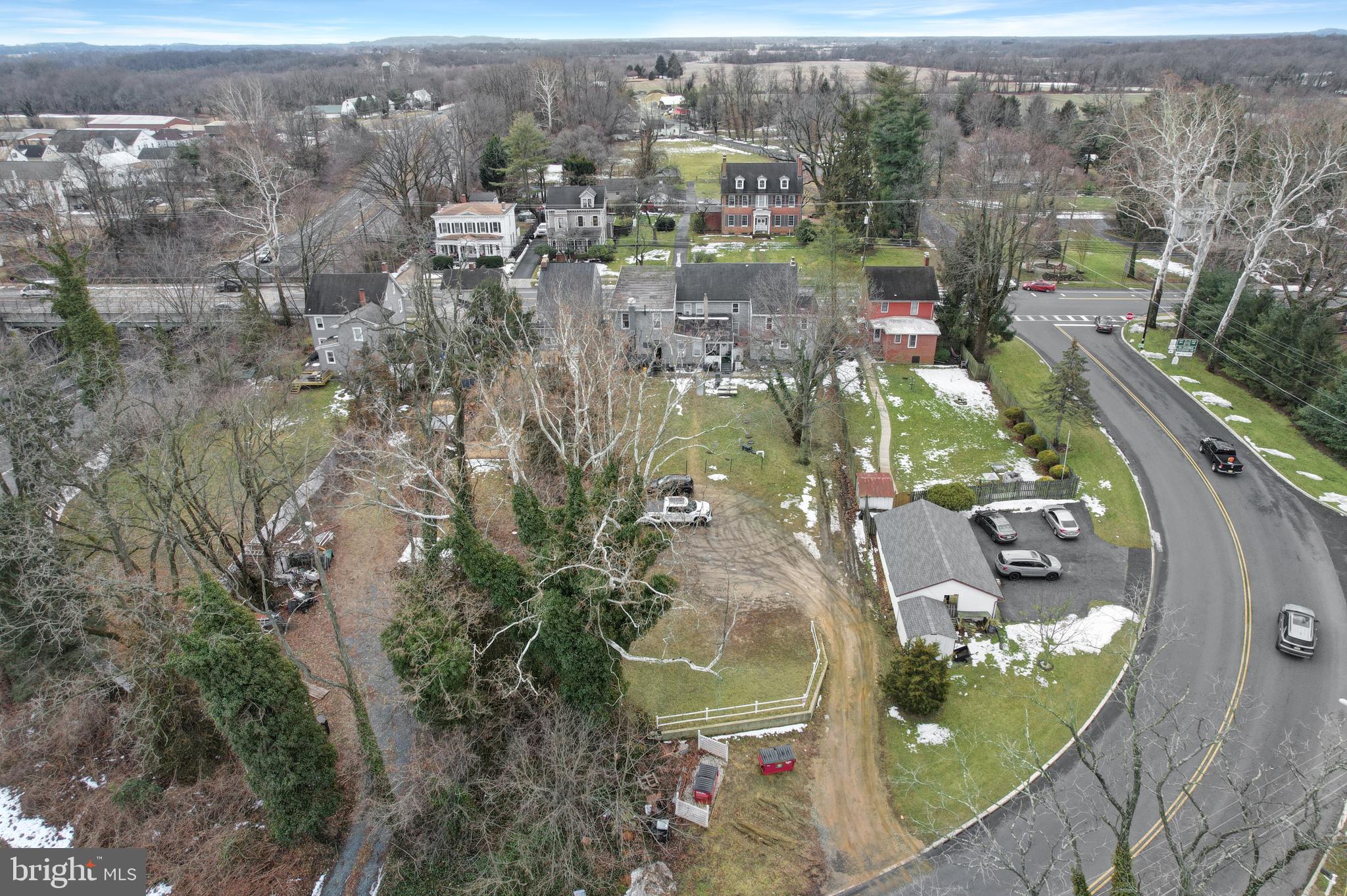 24369 West Main Street, Unit A Columbus, NJ 08022 - Photo 66 of 69 an aerial view of residential houses with outdoor space