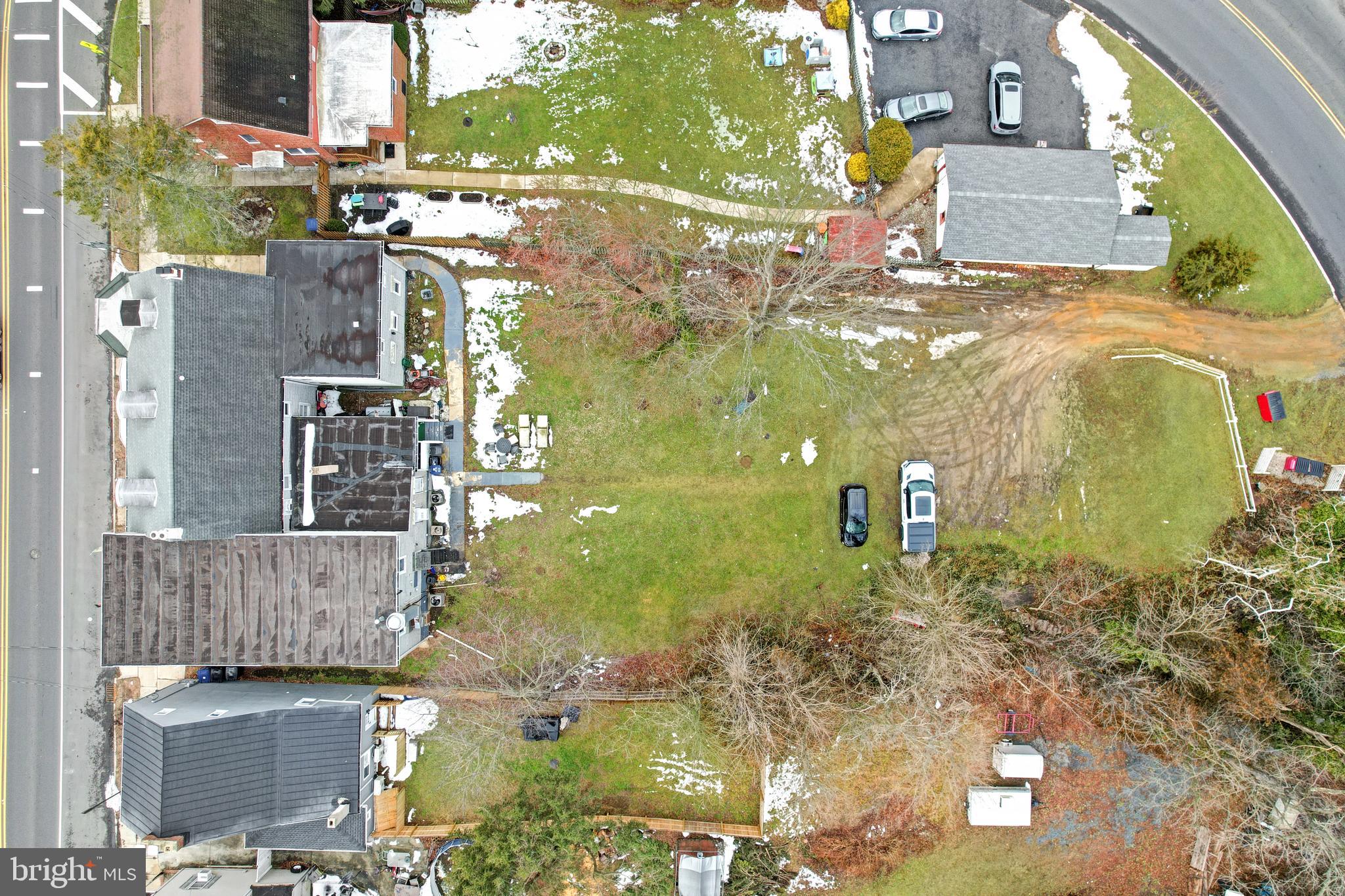 24369 West Main Street, Unit A Columbus, NJ 08022 - Photo 67 of 69 a aerial view of a residential apartment building with a yard