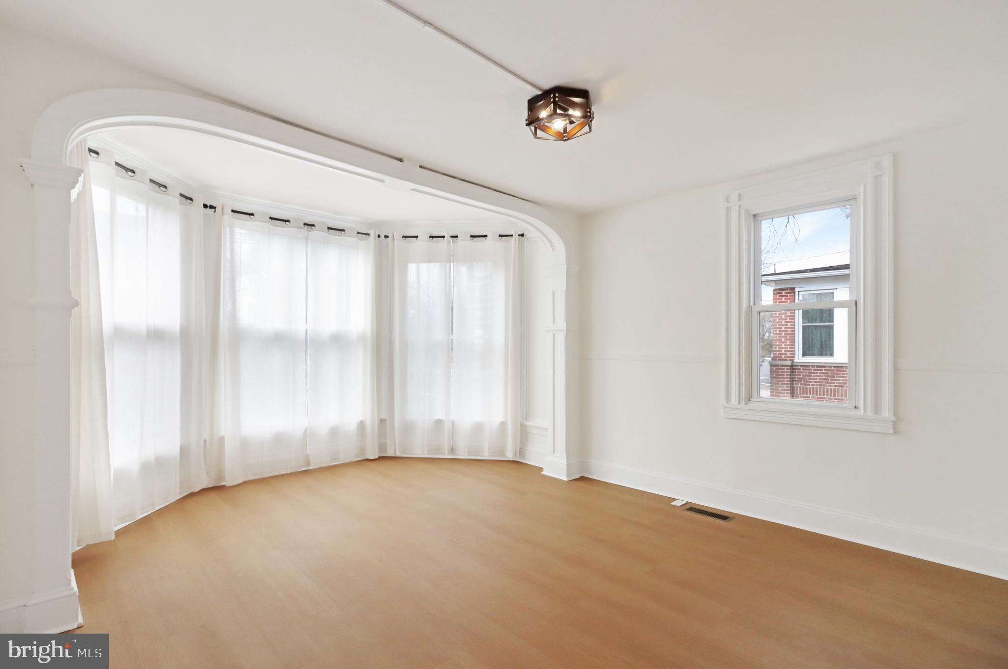 24369 West Main Street, Unit A Columbus, NJ 08022 - Photo 10 of 69 a view of an empty room with a window