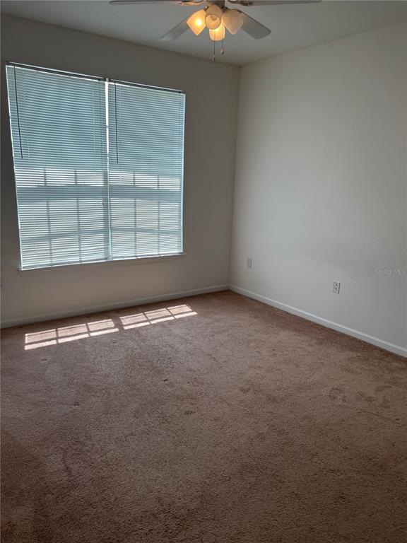 12849 Madison Pointe Circle, Unit 305 Orlando, FL 32821 - Photo 3 of 9