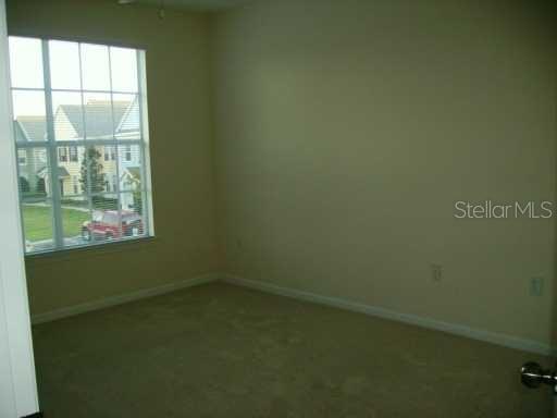 12849 Madison Pointe Circle, Unit 305 Orlando, FL 32821 - Photo 5 of 9