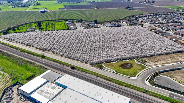 a view of a tennis court with a large window