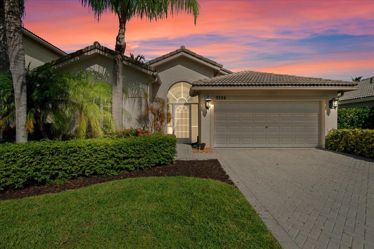 3526 Old Lighthouse Circle Wellington, FL 33414 - Photo 1 of 35 3526 front SUNSET