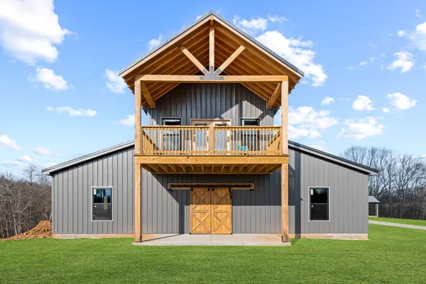 a front view of a house with garage