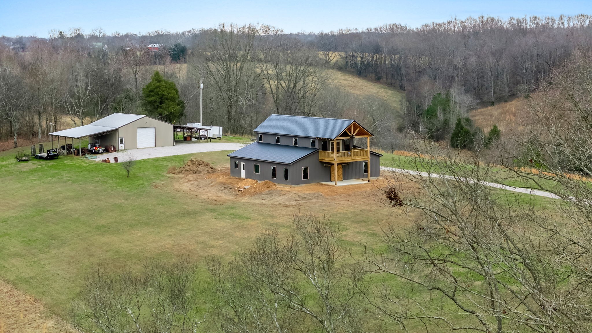 190 Reece Lane Pulaski, TN 38478 - Photo 20 of 70 a view of a house with a yard and sitting area