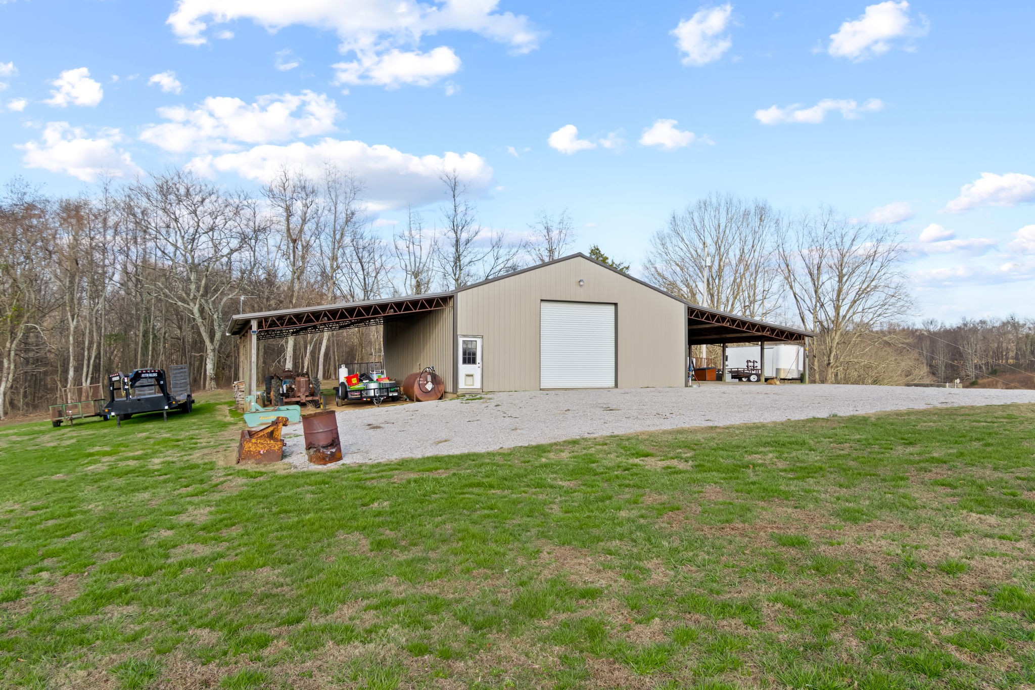 190 Reece Lane Pulaski, TN 38478 - Photo 26 of 70 a view of a house with backyard and sitting area