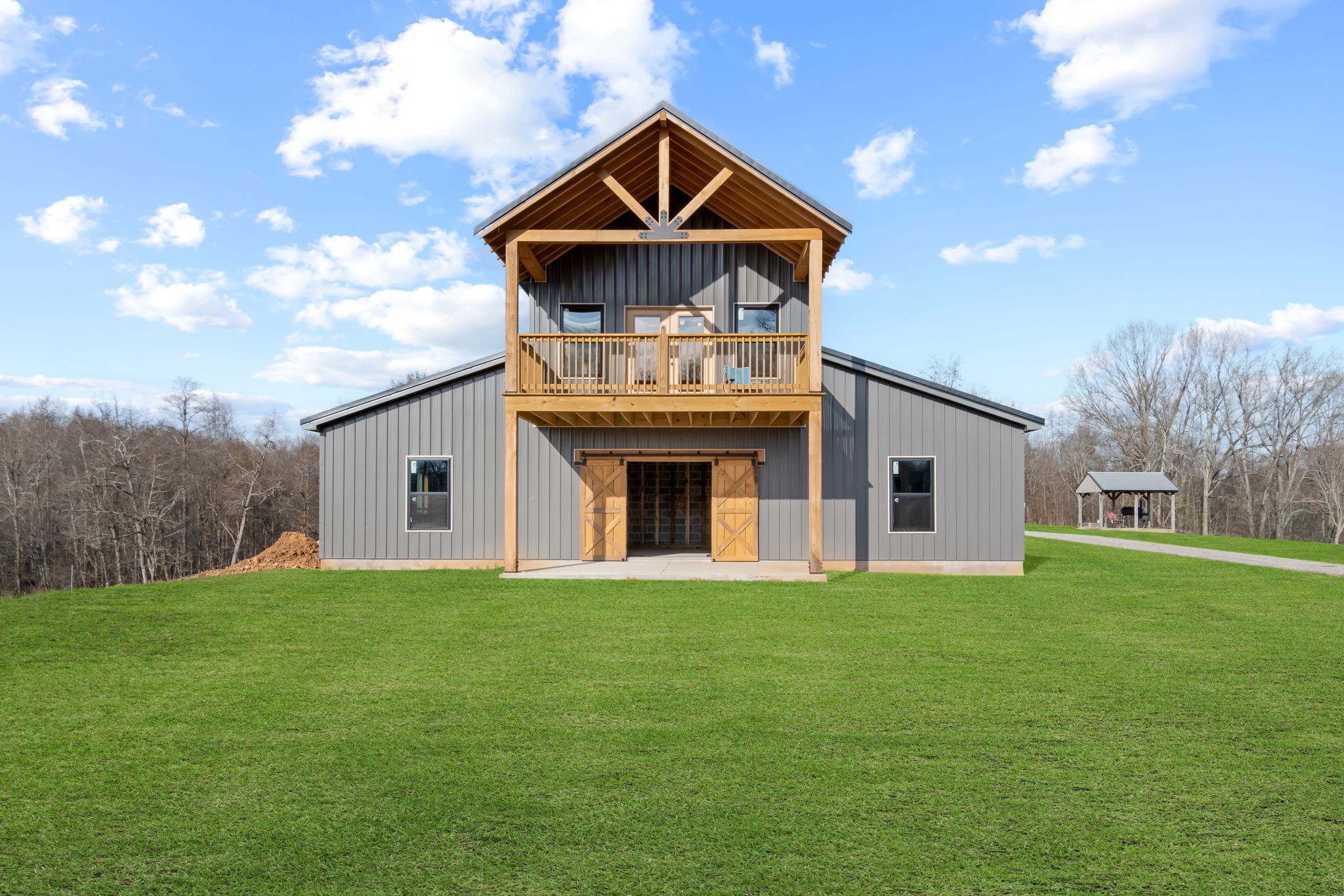 190 Reece Lane Pulaski, TN 38478 - Photo 3 of 70 a front view of a house with a yard and garage
