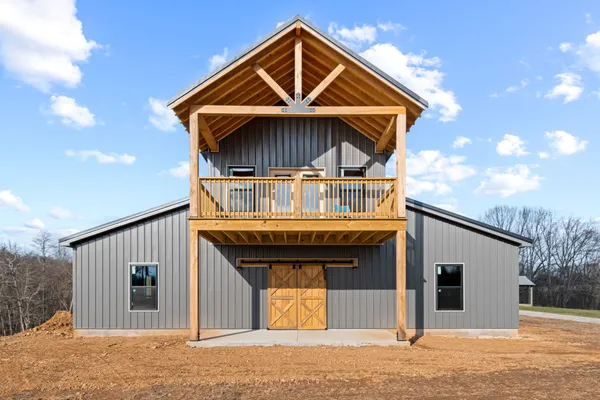 a front view of a house with yard
