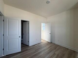 706 Old Station Angier, NC 27501 - Photo 10 of 19 a view of a livingroom with wooden floor