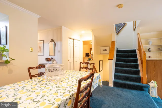 a bedroom with furniture and wooden floor