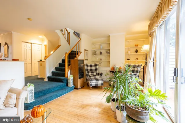 a workspace with furniture and a potted plant