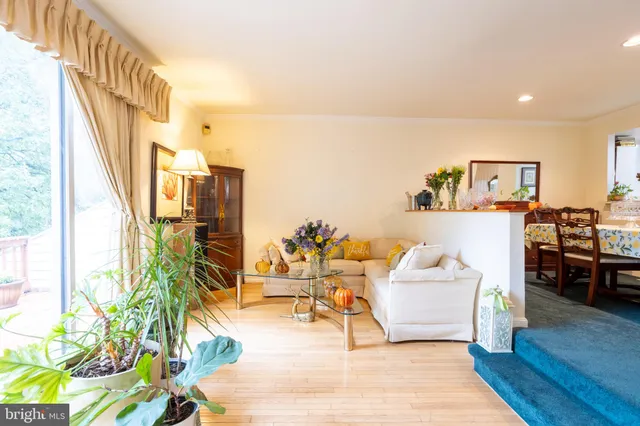 a living room with patio furniture