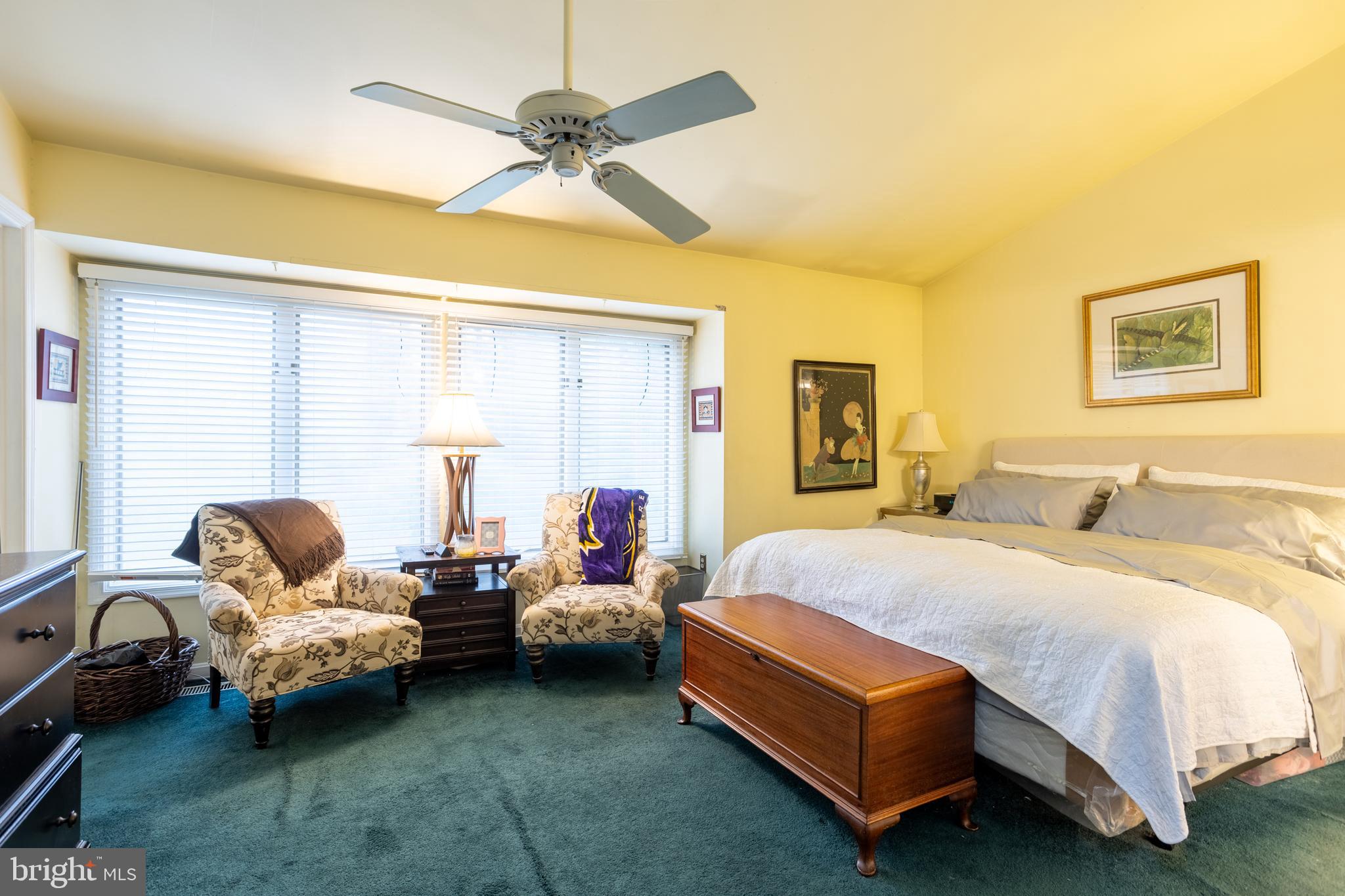 5065 Columbia Road, Unit 18 11 Columbia, MD 21044 - Photo 18 of 51 a bedroom with a bed couch and window
