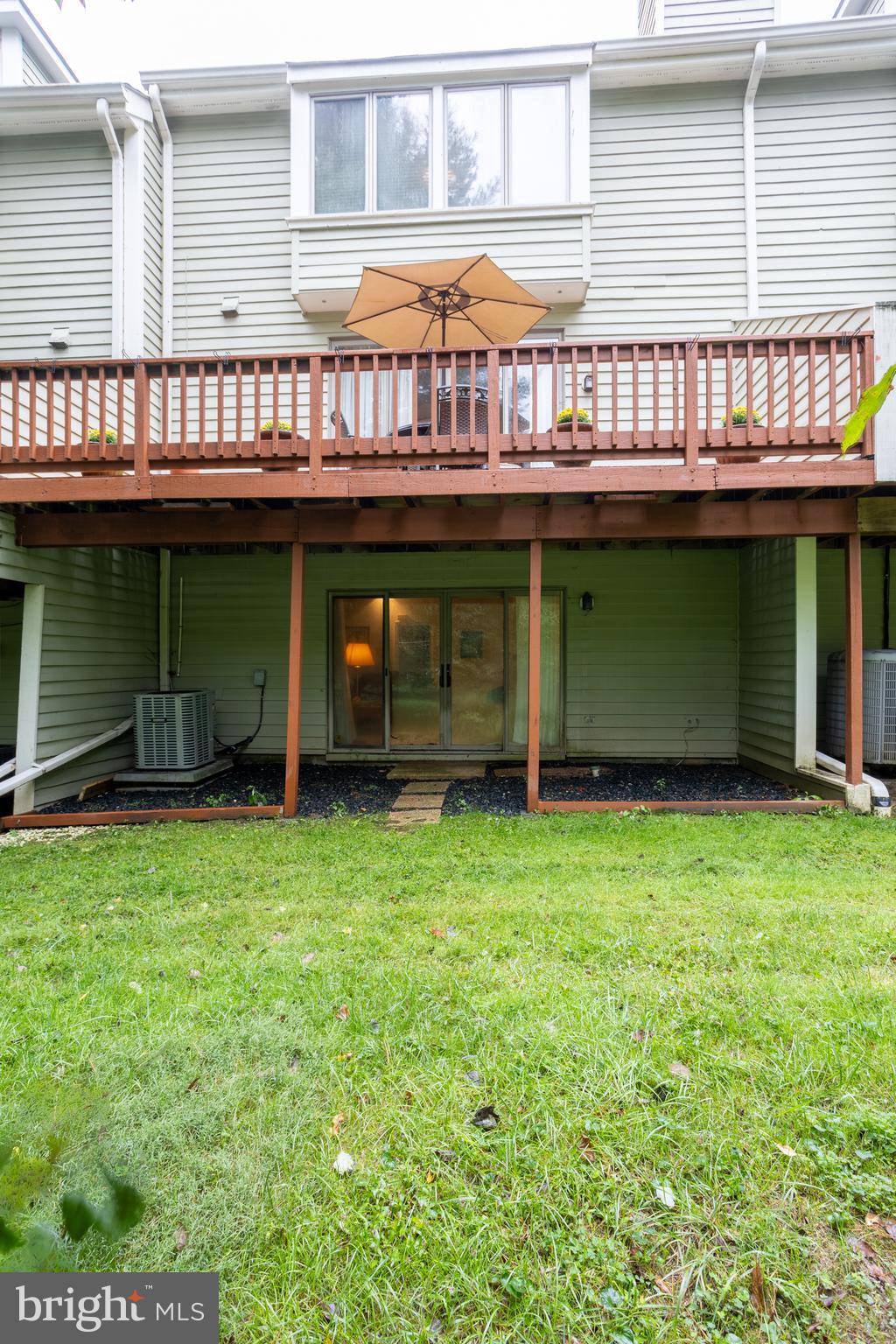 5065 Columbia Road, Unit 18 11 Columbia, MD 21044 - Photo 47 of 51 a view of a house with a backyard
