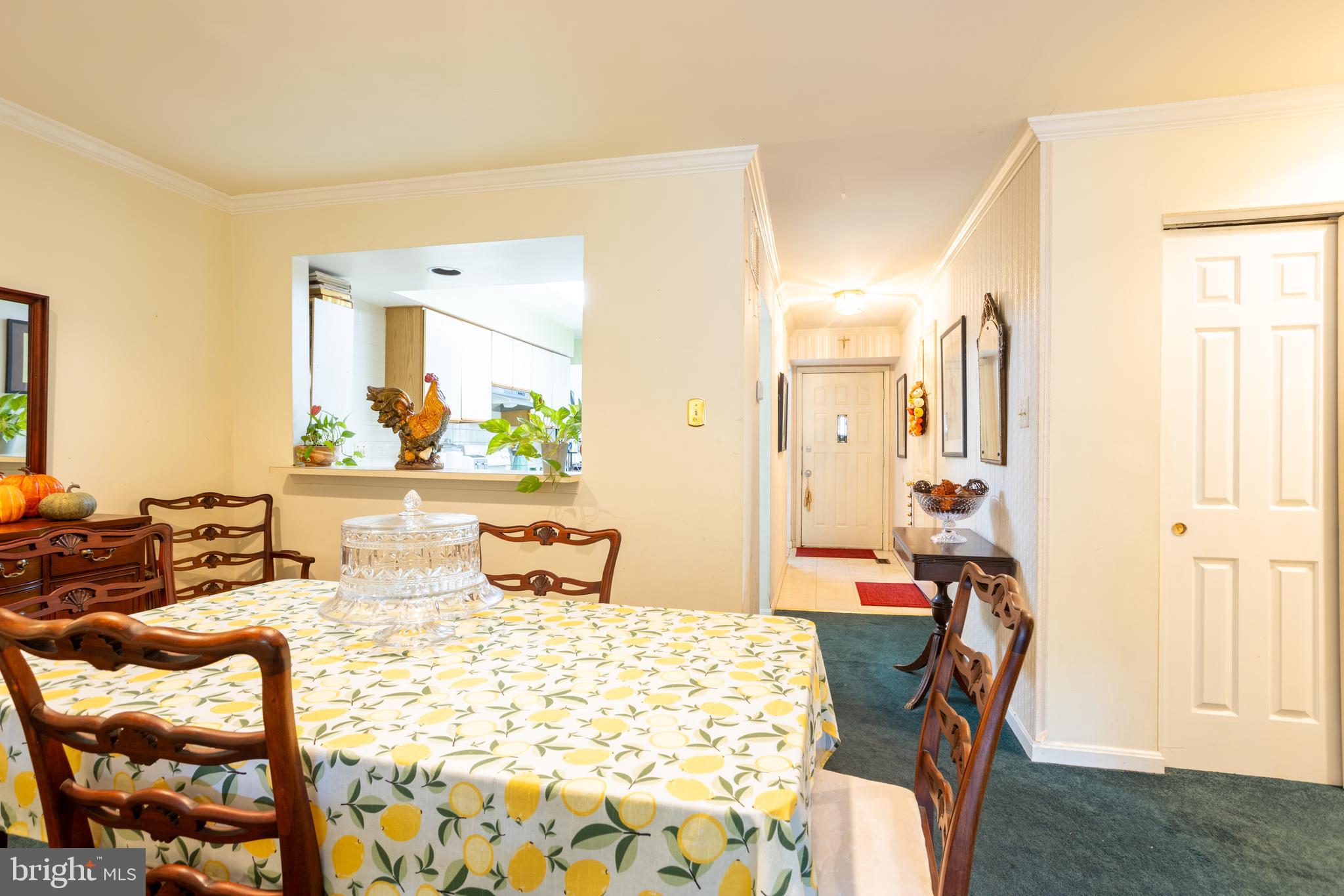5065 Columbia Road, Unit 18 11 Columbia, MD 21044 - Photo 8 of 51 a living room with furniture and wooden floor