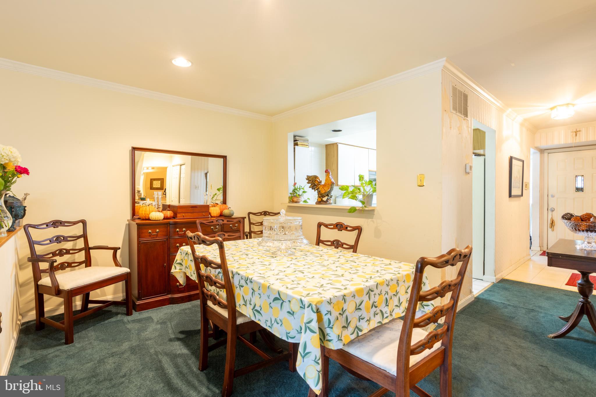 5065 Columbia Road, Unit 18 11 Columbia, MD 21044 - Photo 9 of 51 a view of a dining room with furniture