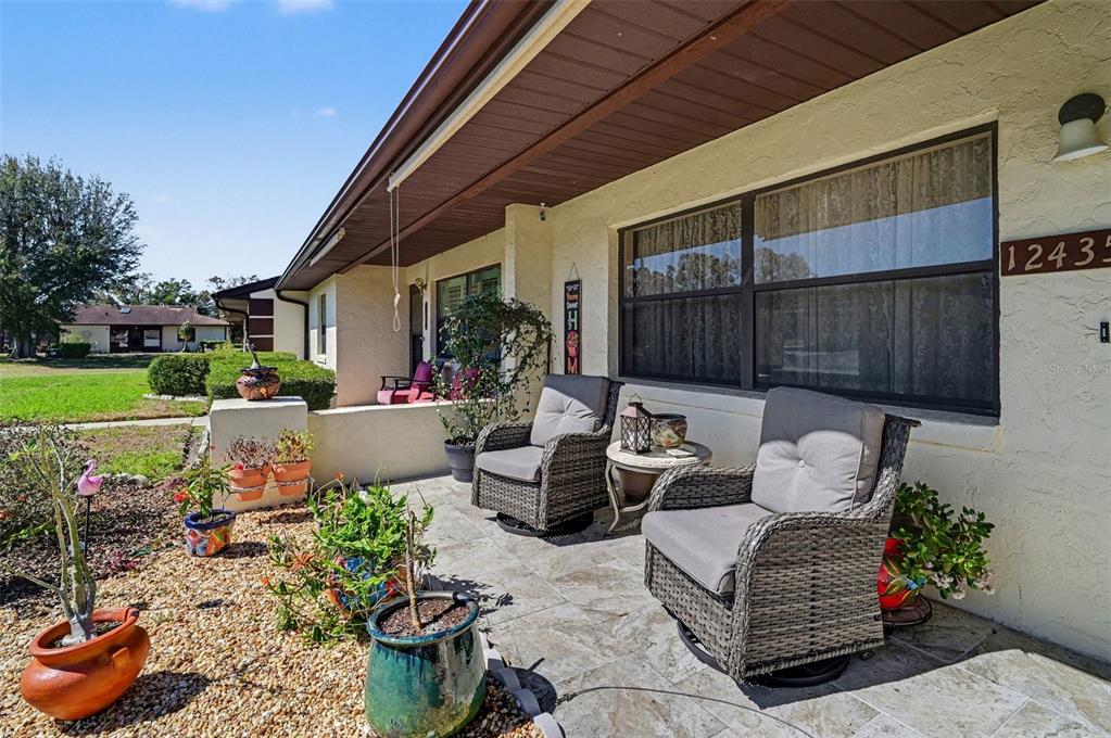 12435 Orangewood Circle Tavares, FL 32778 - Photo 5 of 30 a view of a patio with couches and potted plants