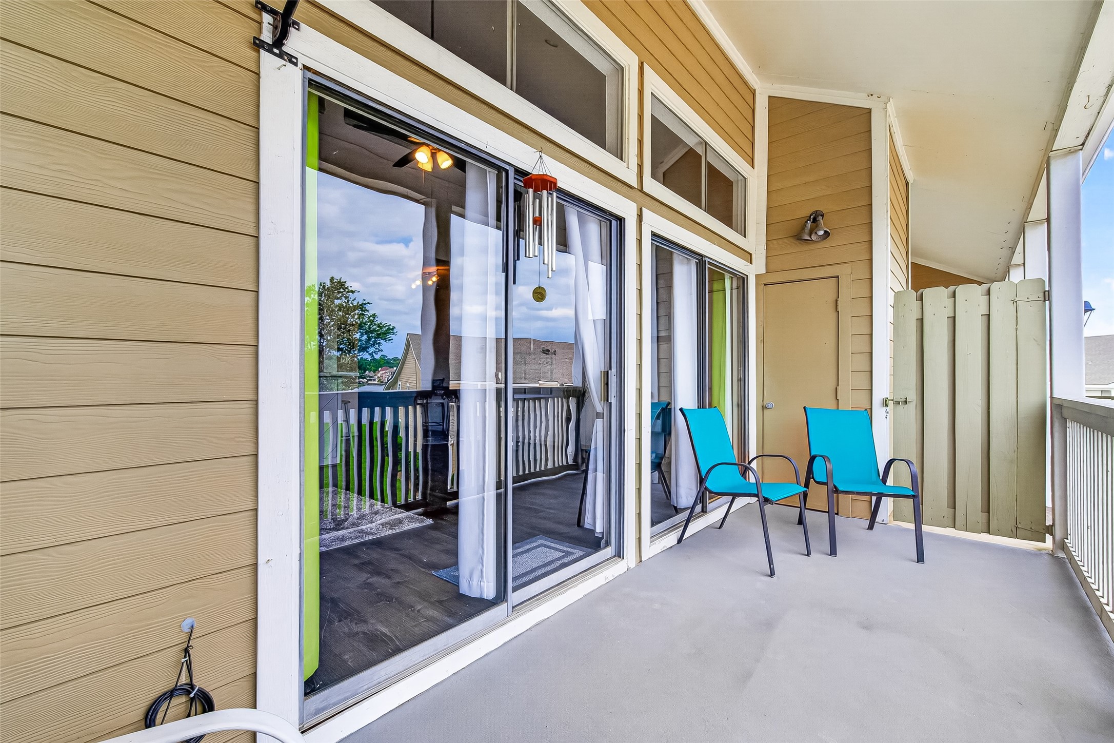 168 April Point Drive South, Unit 168 Conroe, TX 77356 - Photo 28 of 39 a view of a building with a patio
