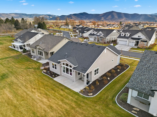 108 West Monte Rosa Lane Midway, UT 84049 - Photo 44 of 48 Aerial perspective showcasing a modern residence with a dark shingle roof and light-colored siding