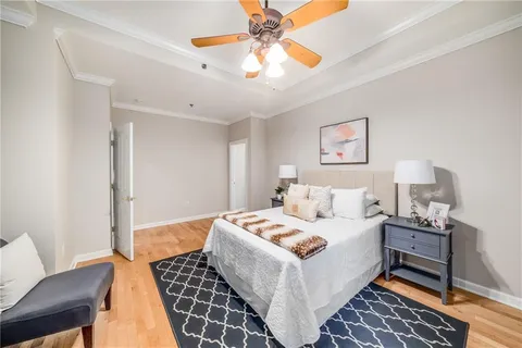 a bedroom with furniture and a window