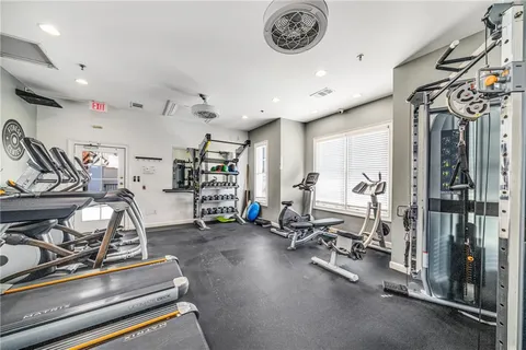 a view of a car is parked in front of a house