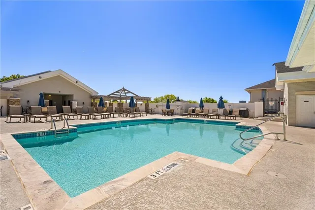 a view of a building with a street