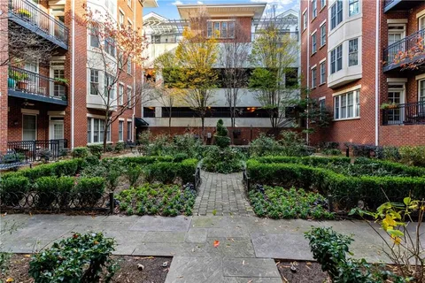 an aerial view of a house with a garden