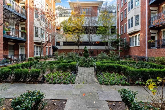 an aerial view of a house with a garden