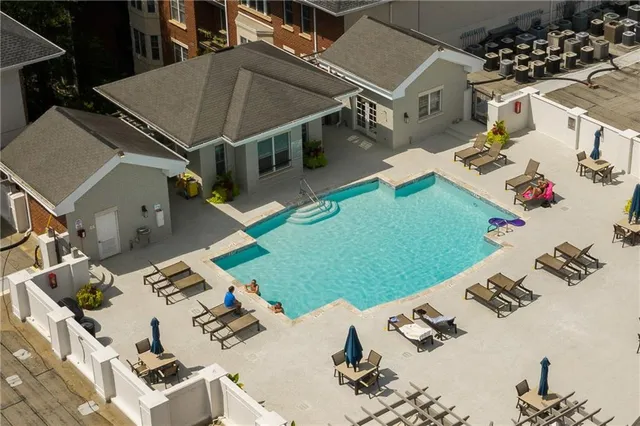 a view of a patio with swimming pool