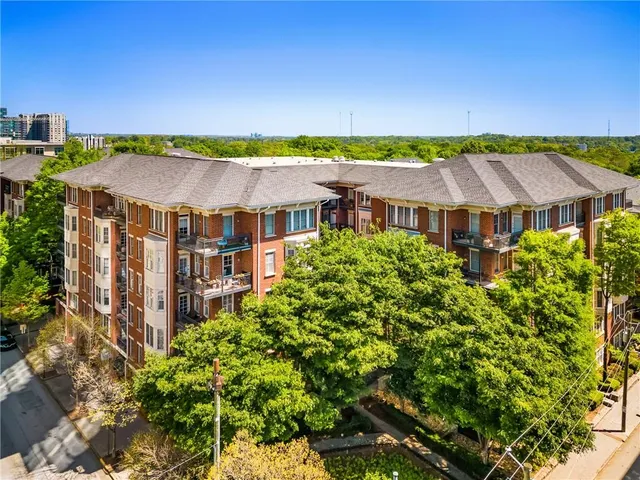 a view of a city with tall buildings