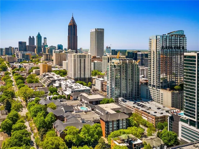 a view of a city with tall buildings