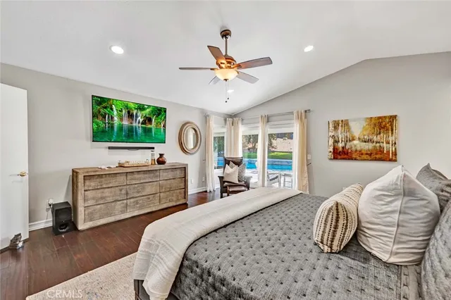 a bedroom with furniture and a window