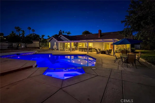 a view of a red chairs in front of a building
