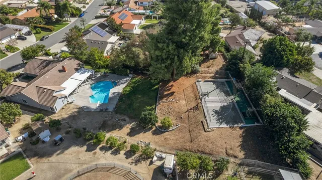 an aerial view of residential house with outdoor space