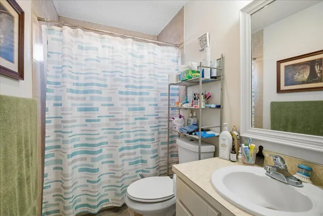 a work room with furniture and a chair