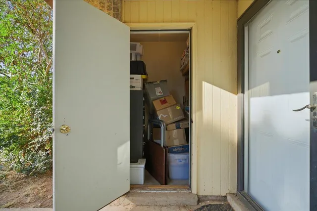 front view of a house with a trees