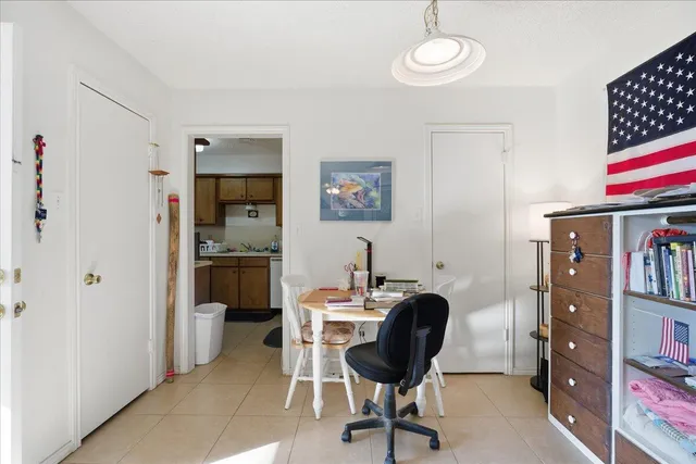 a kitchen with sink cabinets and appliances