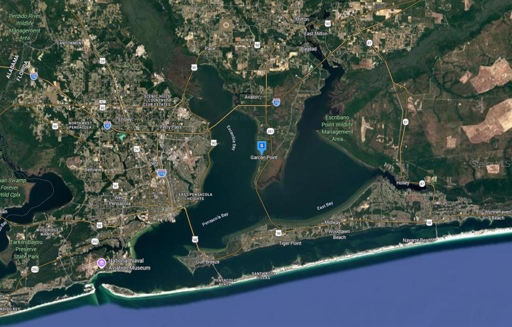 1086 Pearson Road Milton, FL 32583 - Photo 6 of 6 an aerial view of a house