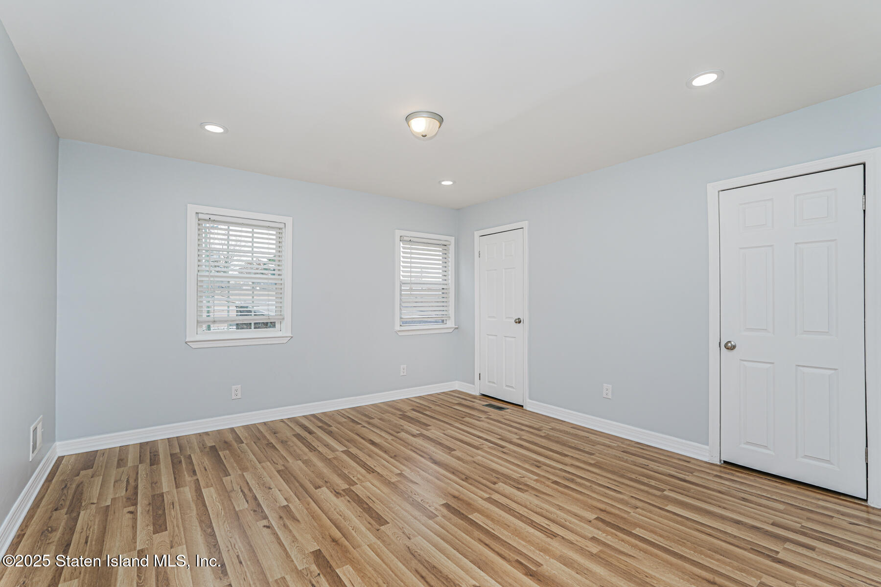 13 Laforge Avenue Staten Island, NY 10302 - Photo 13 of 31 a view of room with wooden floor and window