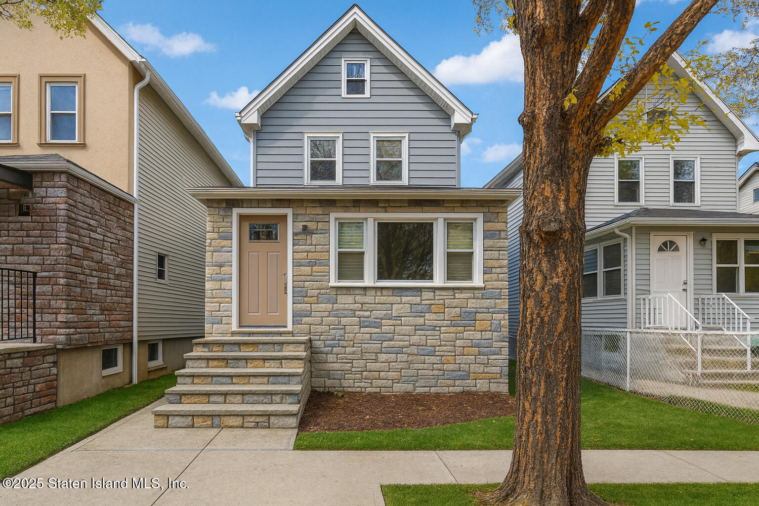 13 Laforge Avenue Staten Island, NY 10302 - Photo 2 of 31 a front view of a house with a yard