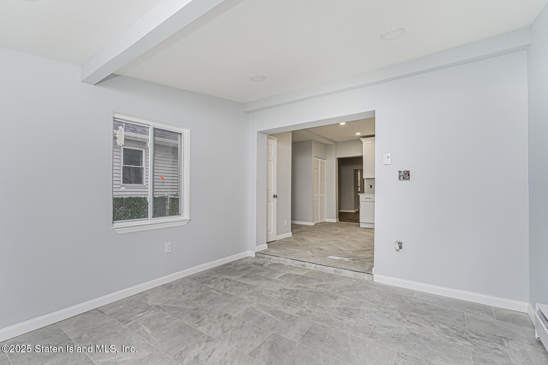 13 Laforge Avenue Staten Island, NY 10302 - Photo 22 of 31 an empty room with windows and closet