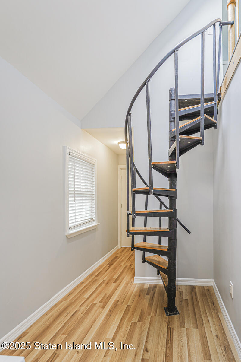 13 Laforge Avenue Staten Island, NY 10302 - Photo 26 of 31 a view of entryway with wooden floor and stairs