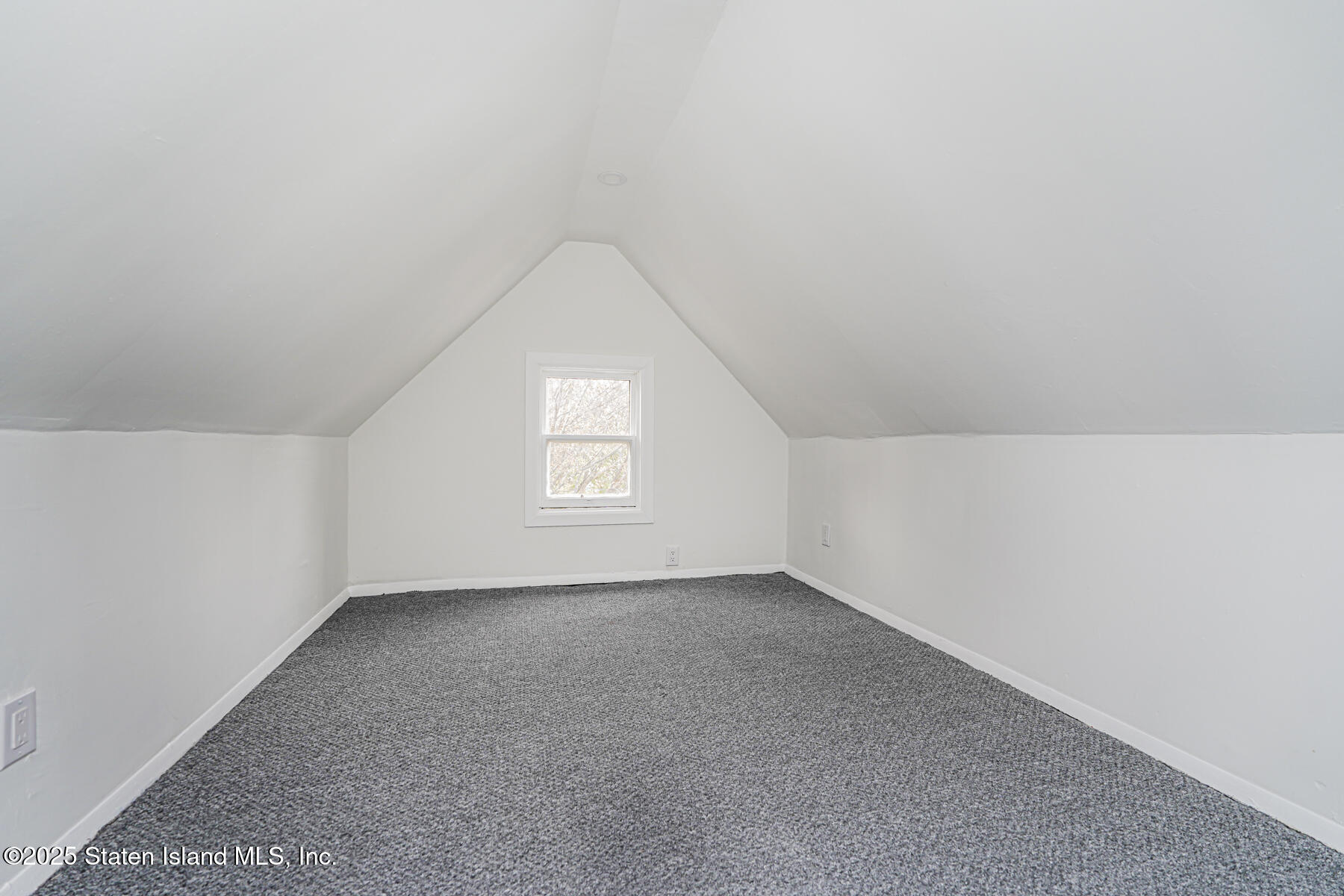 13 Laforge Avenue Staten Island, NY 10302 - Photo 28 of 31 an empty room with a window