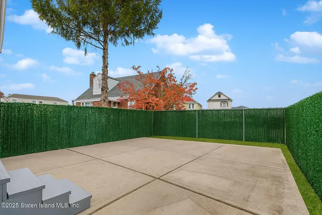 a view of an outdoor space and a yard
