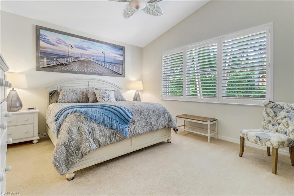 9146 Springview Loop Estero, FL 33928 - Photo 13 of 49 a bedroom with a bed and a couch