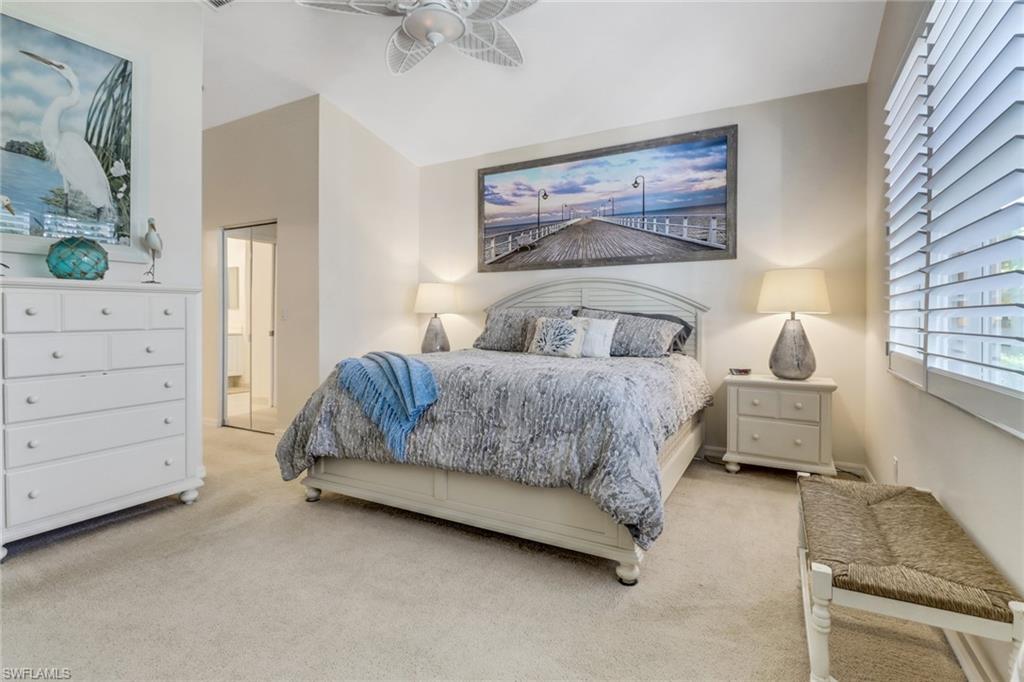 9146 Springview Loop Estero, FL 33928 - Photo 14 of 49 a bedroom with a bed and dresser